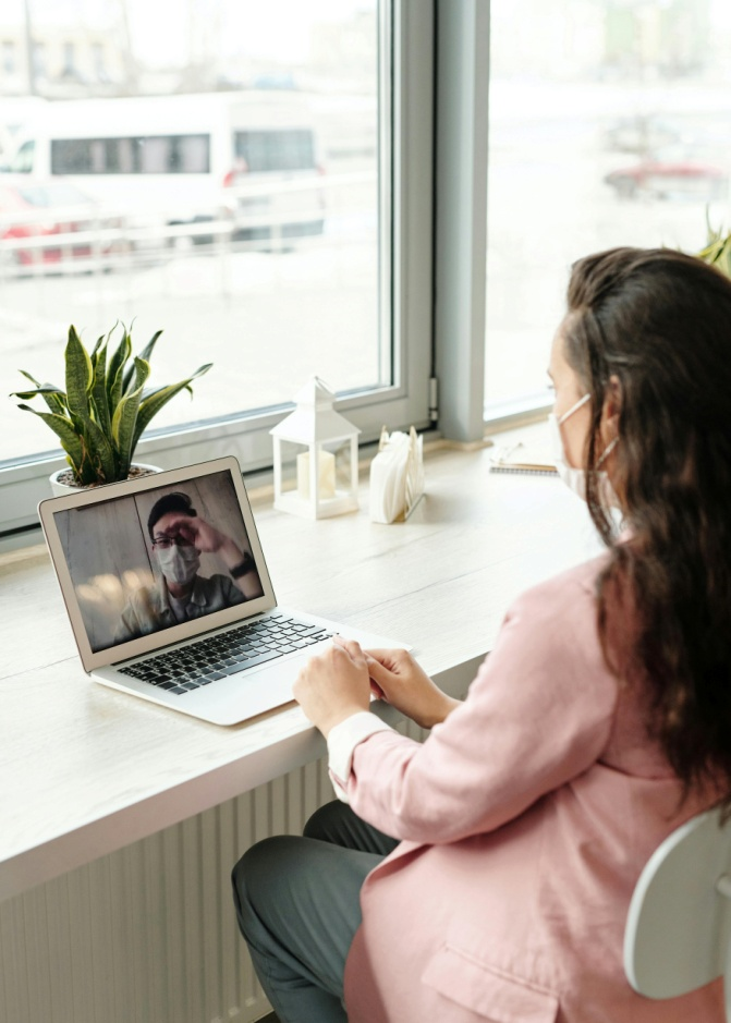 A woman engaged in a video call