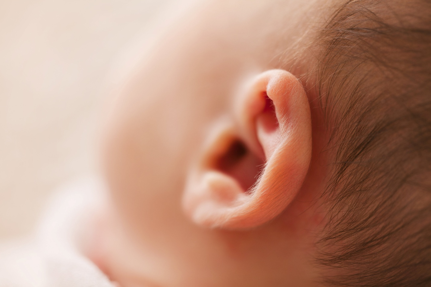 A close-up shot of a baby's ear