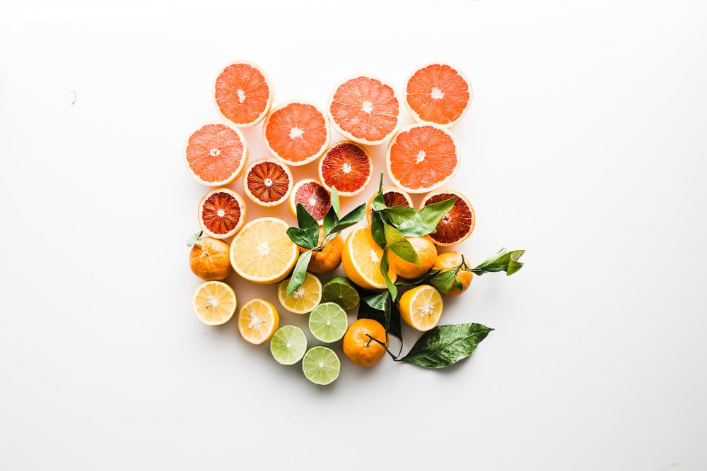 Photo of citrus fruits on a white background