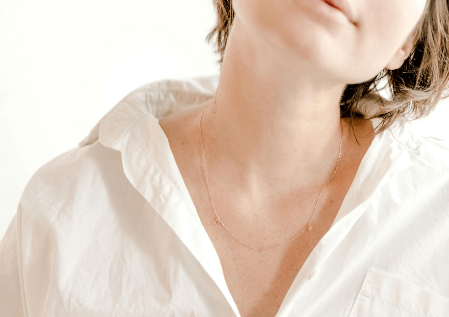 A close-up of a woman's neck