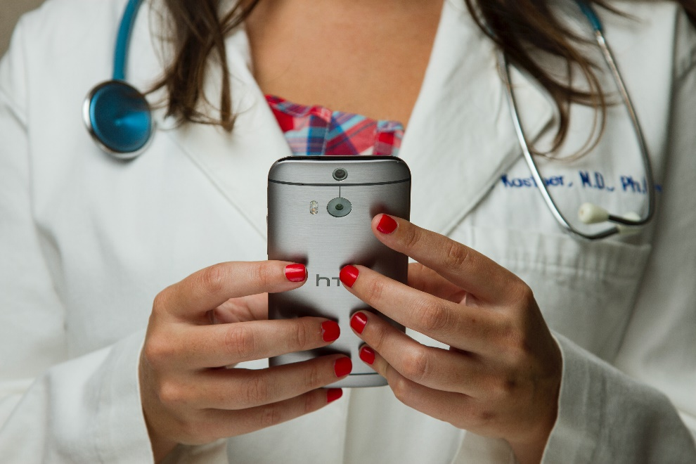 Cell phone in the hands of a doctor