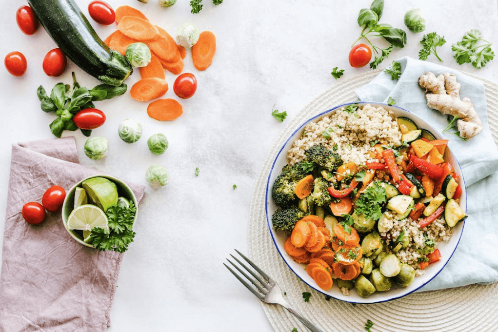 Plate of healthy food, including fish and vegetables