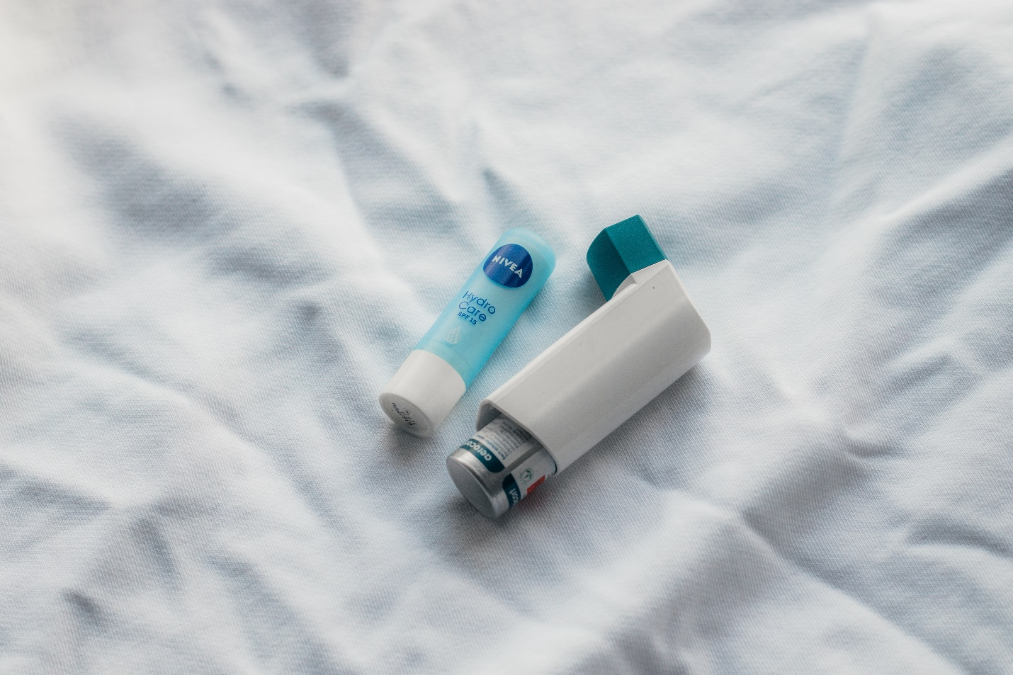 An inhaler and a lip balm