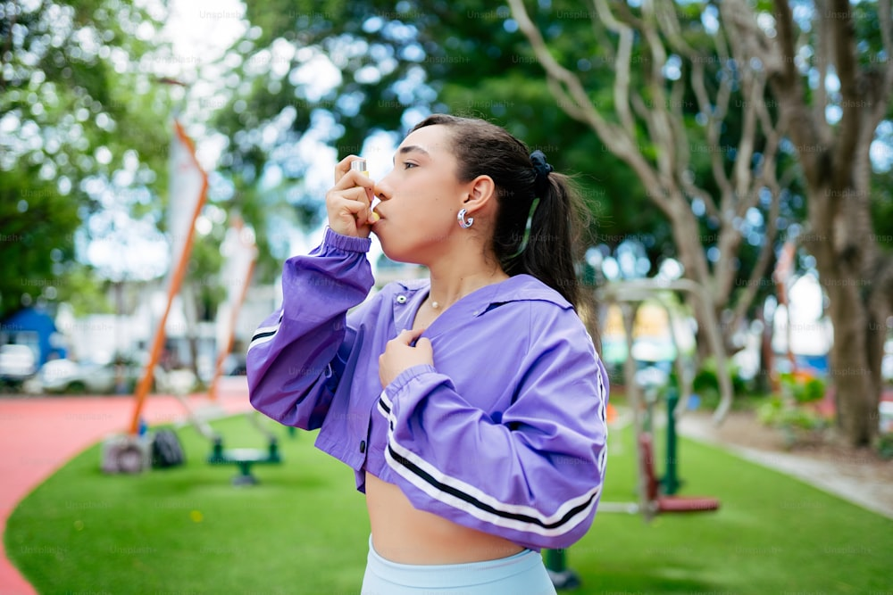 Woman using inhaler