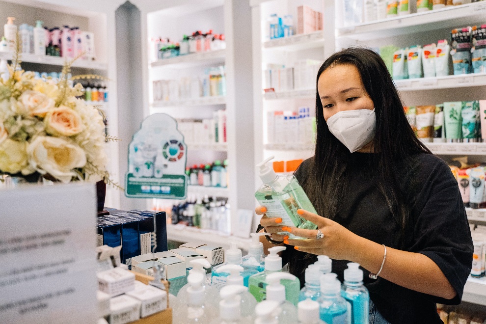 Masked woman at a pharmacy