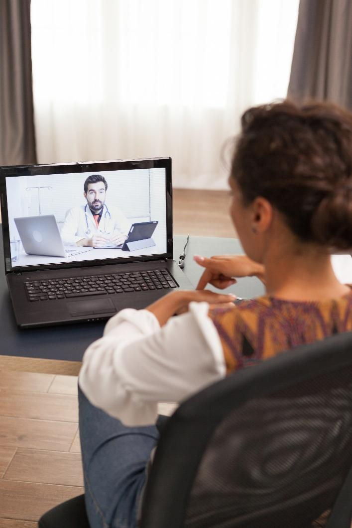 A patient video chatting with a doctor