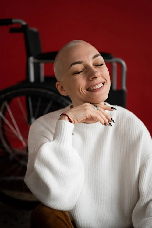 Woman in front of a wheelchair