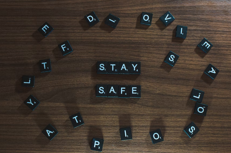 Scrabble tiles that say stay safe 