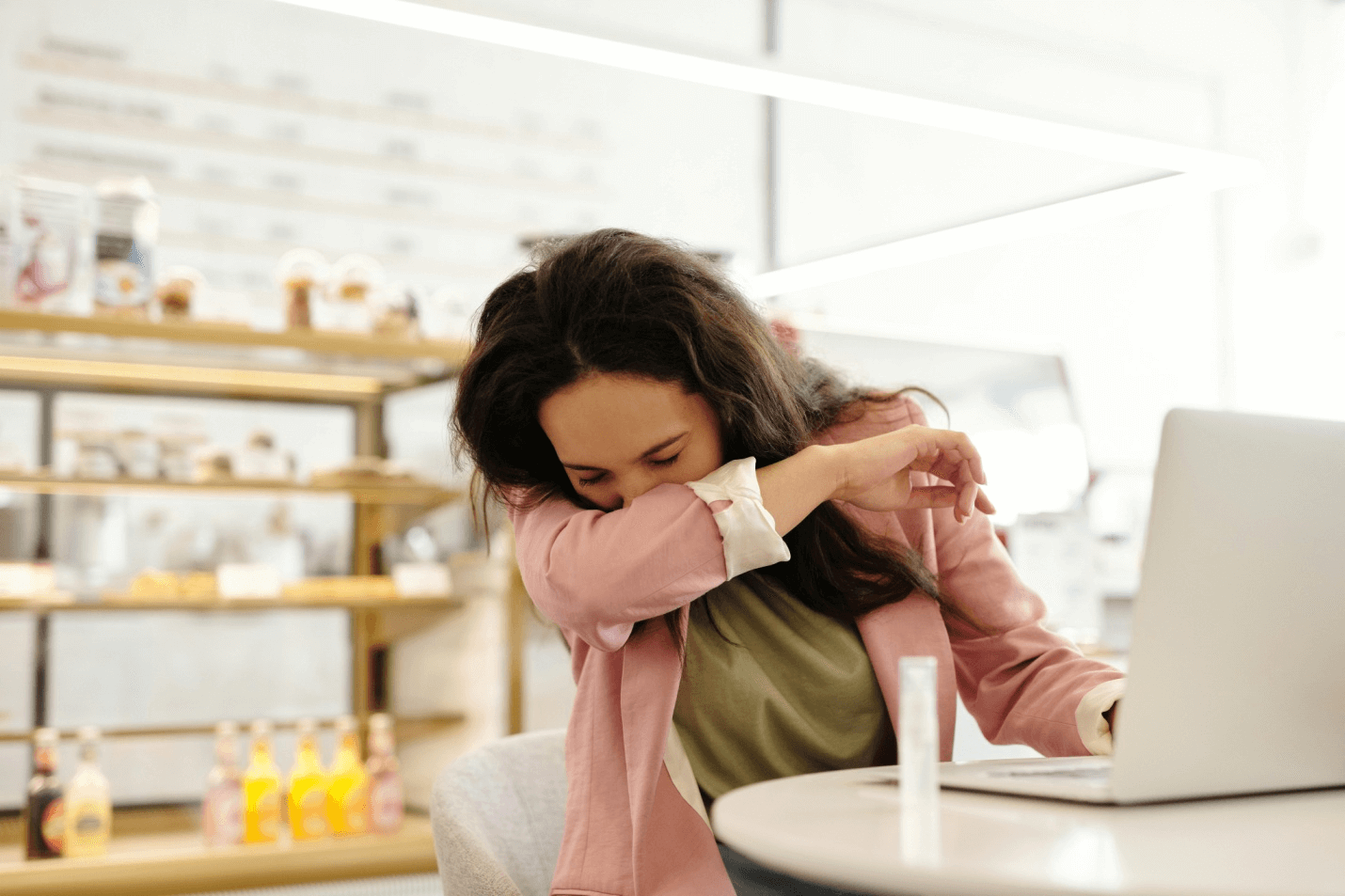 A woman coughing 