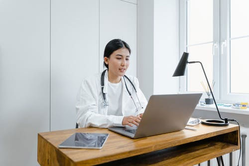 A doctor providing online medical consultation in Washington