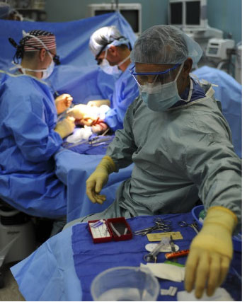 Surgeons operating a patient at the hospital