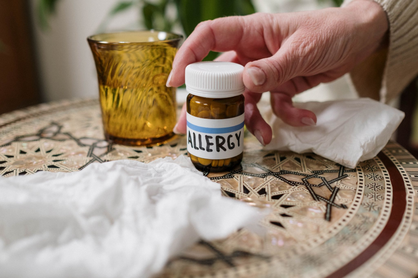  picture of allergy medication bottle on the table