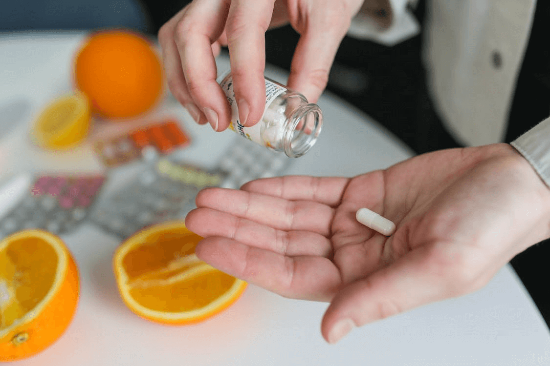 A person taking medication