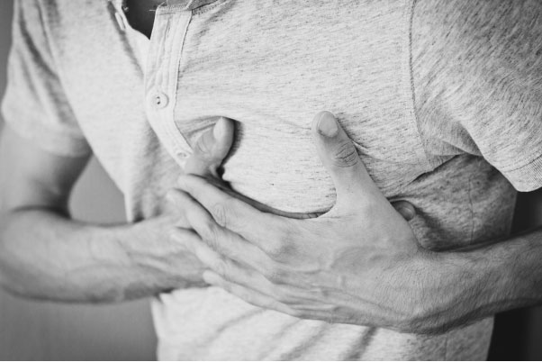 A person experiencing chest pain