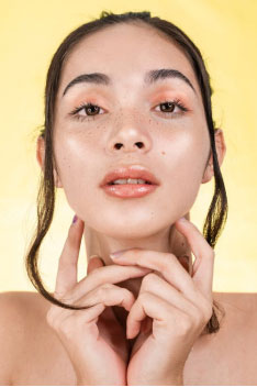 a woman with clear and hydrated skin