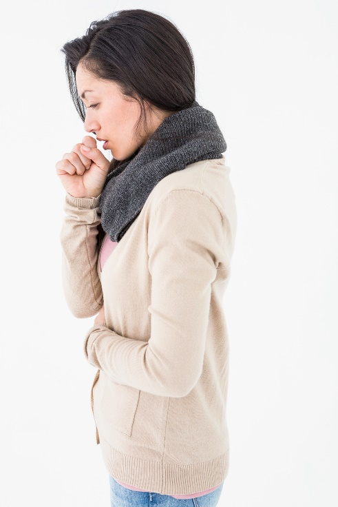 A coughing woman.