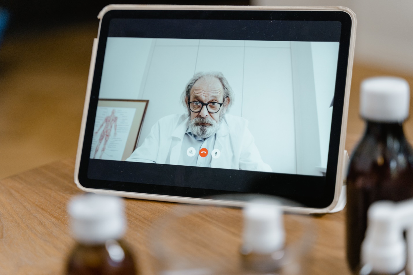 a doctor taking an appointment through video call 