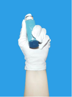 a person holding an inhaler