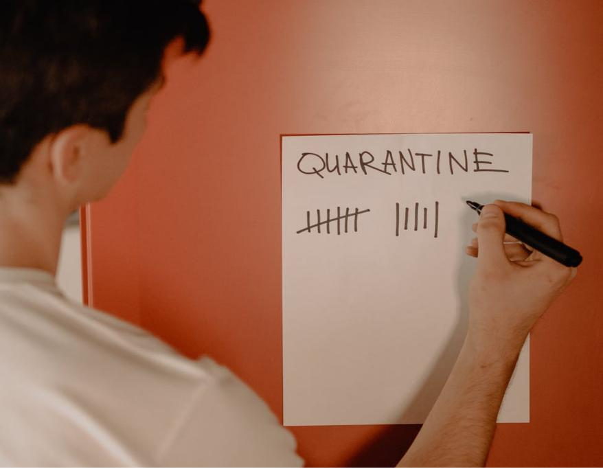 A person counting down the days of quarantine.