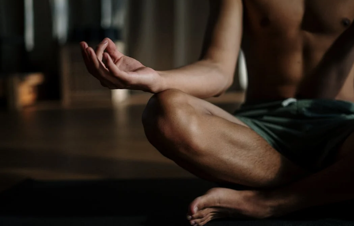 A man with mild erectile dysfunction taking yoga classes to relieve stress