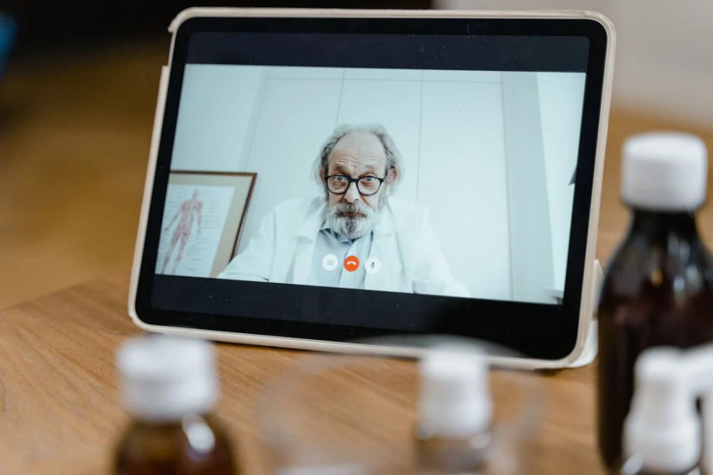  A photo of a doctor on a video call on a tablet