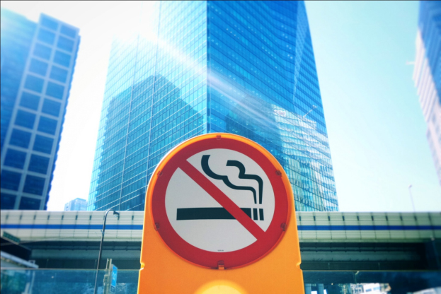 a no-smoking sign on the street