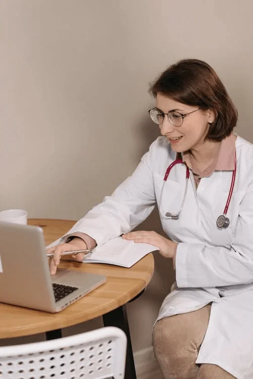 A doctor conducting an online appointment