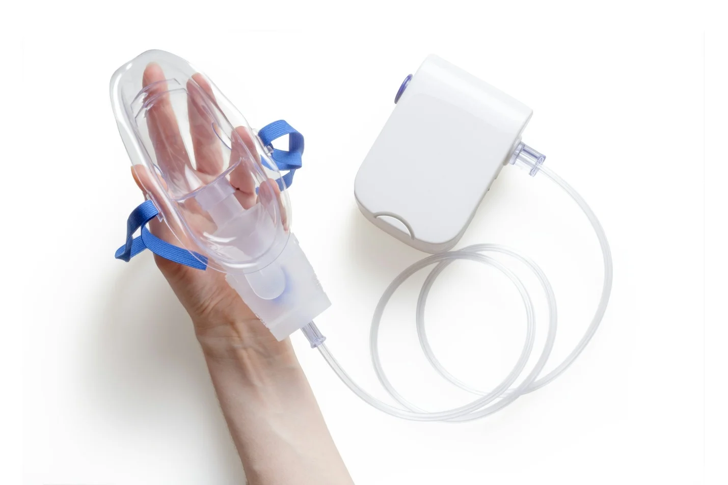 holding a nebulizer