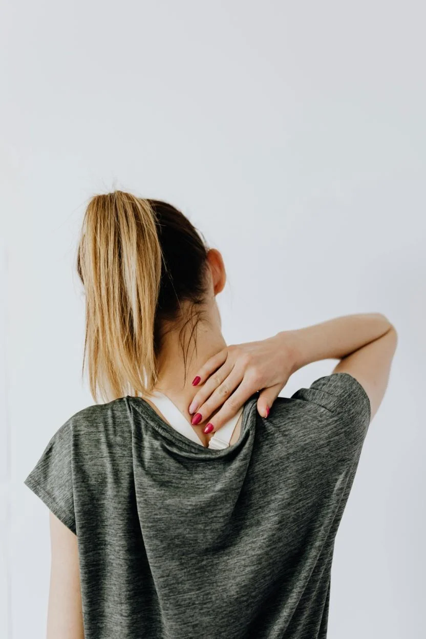 A Woman Having a Neck Pain