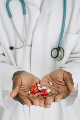 A doctor holding medicine
