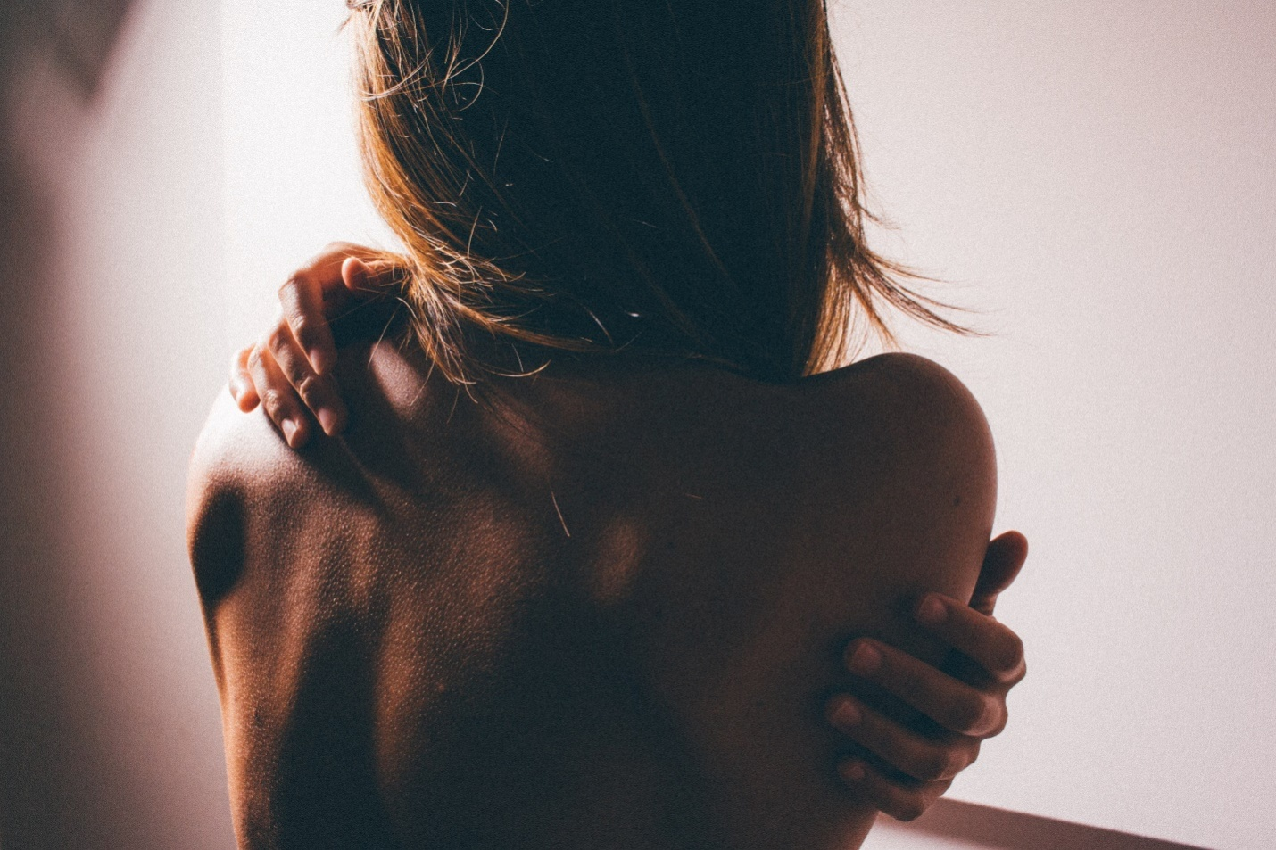 An image of a woman’s back