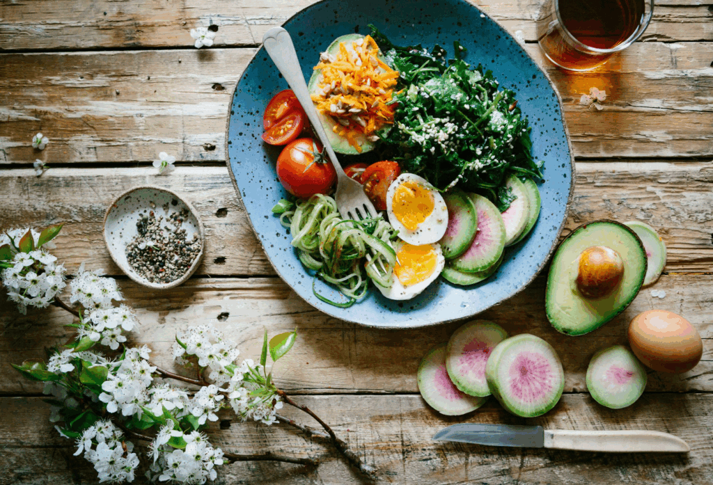 A bowl of vegetables and egg.