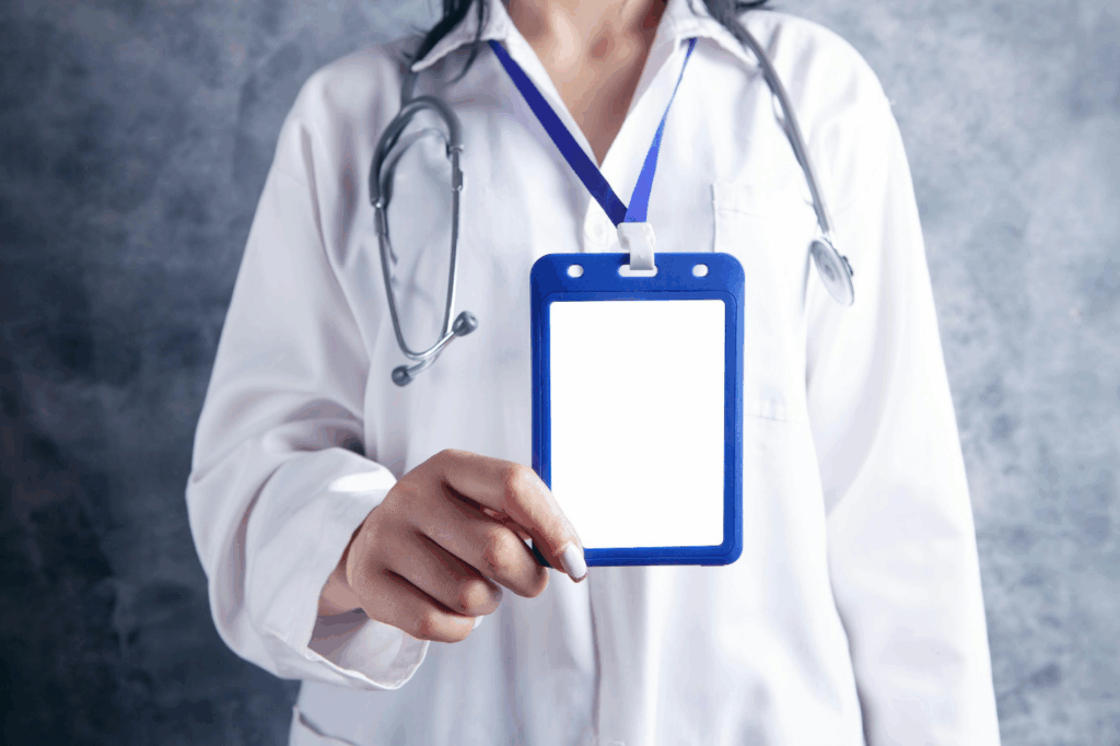 A doctor showing their identity card.