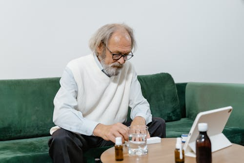 Patient speaking to a doctor on an iPad during a virtual consultation