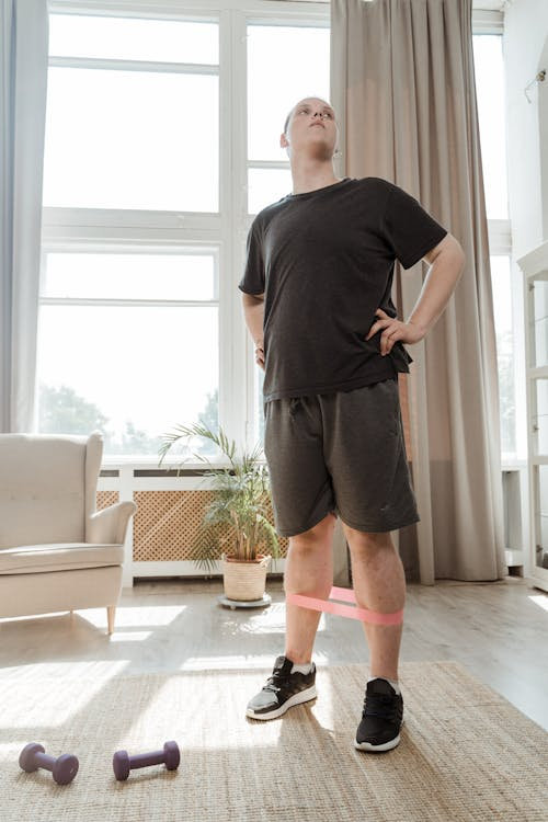 A man exercises at home.