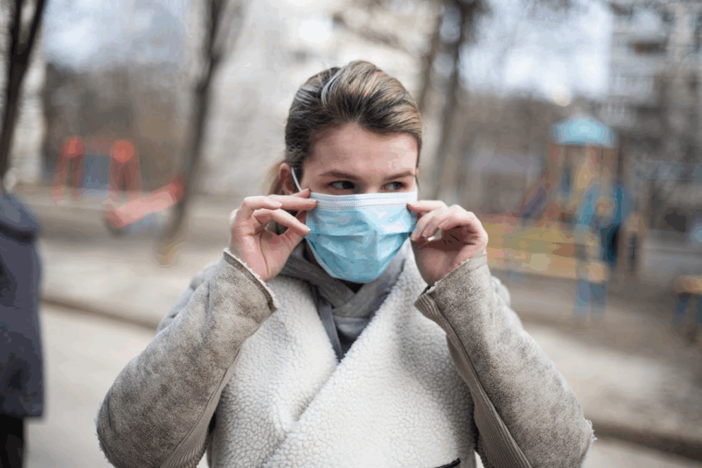 A woman wears a mask in public due to a COPD flare.