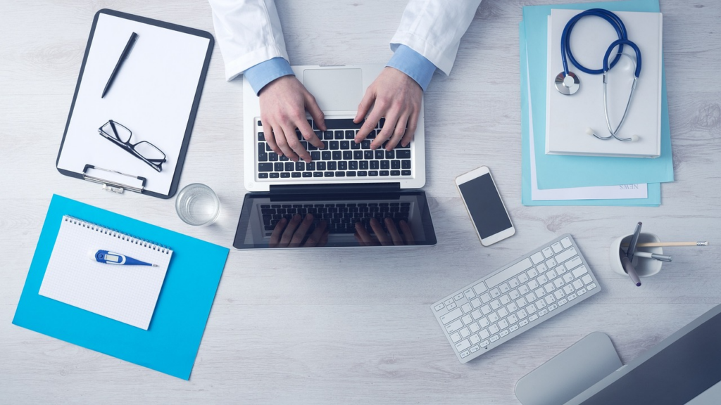 doctor prescribing treatment for winter illness online