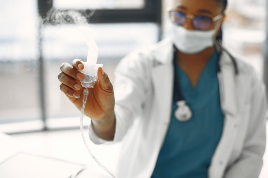 A person offering breathing solutions to their patients. 