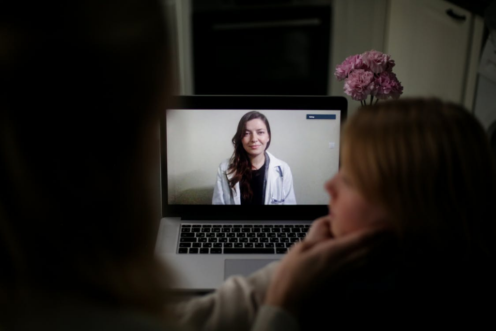 virtual doctor consultation on laptop