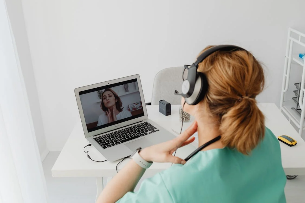Dermatologist conducting an online video consultation with a patient