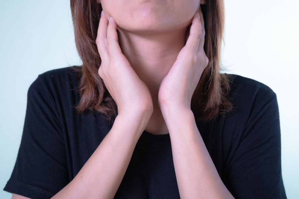 A person with a sore throat.