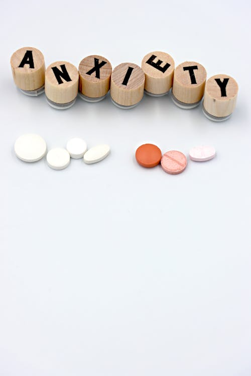 Several pills laid out on a surface.