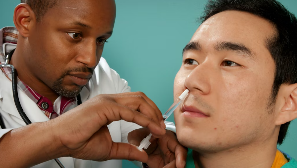 This image shows a doctor helping a sinus patient.
